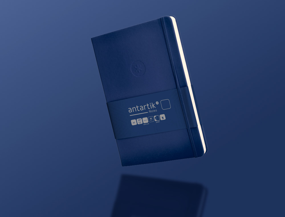 CADERNO COM ELASTICO ANTARTIK NOTES CAPA DURA A5 LISO AZUL MARINHO 100 FOLHAS 80 GR FSC