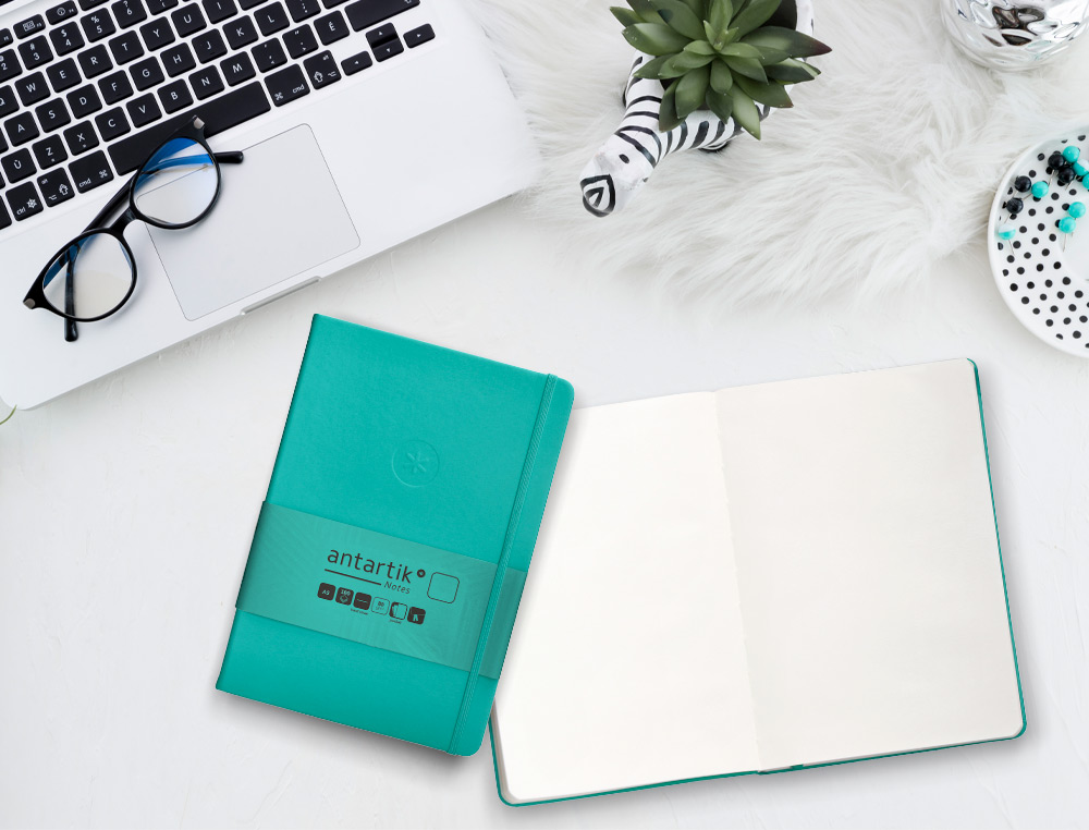 CADERNO COM ELASTICO ANTARTIK NOTES CAPA DURA A5 LISO TURQUESA 100 FOLHAS 80 GR FSC