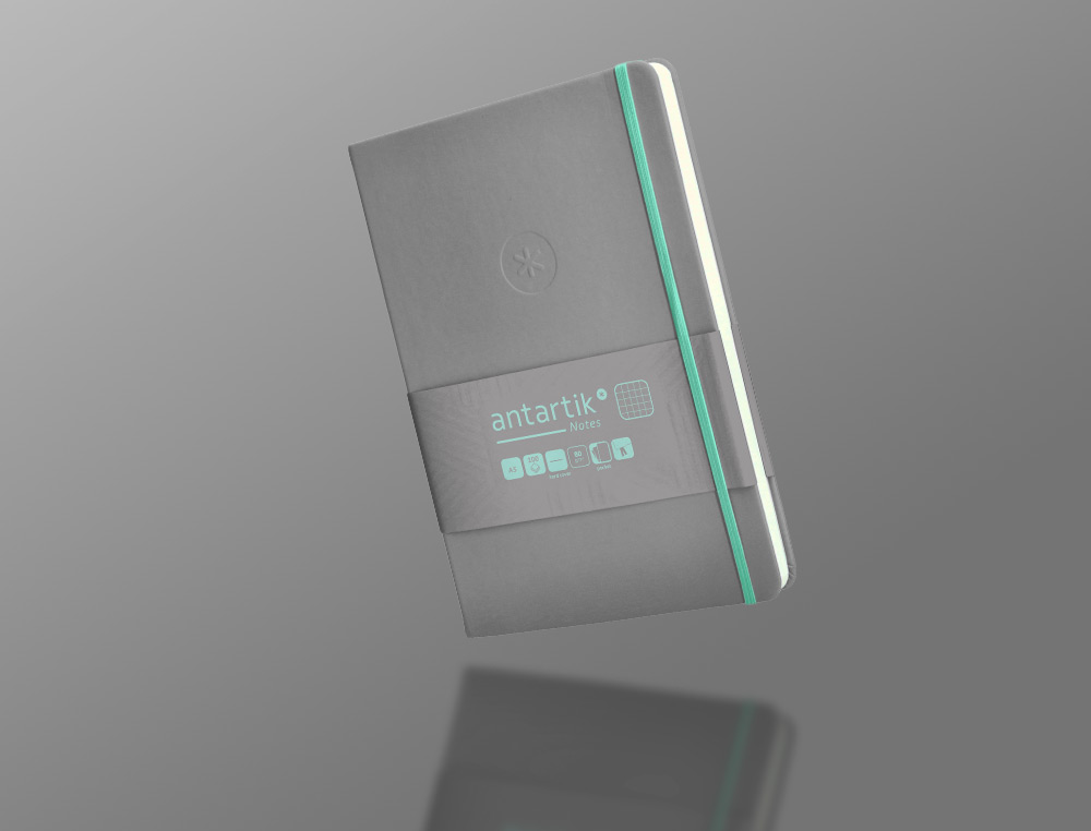 CADERNO COM ELASTICO ANTARTIK NOTES CAPA DURA A5 QUADRICULADO CINZA E TURQUESA 100 FOLHAS 80 GR FSC