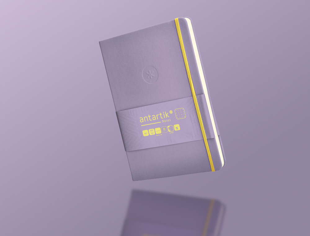 CADERNO COM ELASTICO ANTARTIK NOTES CAPA DURA A5 PONTILHADO ROXO E AMARELO 100 FOLHAS 80 GR FSC